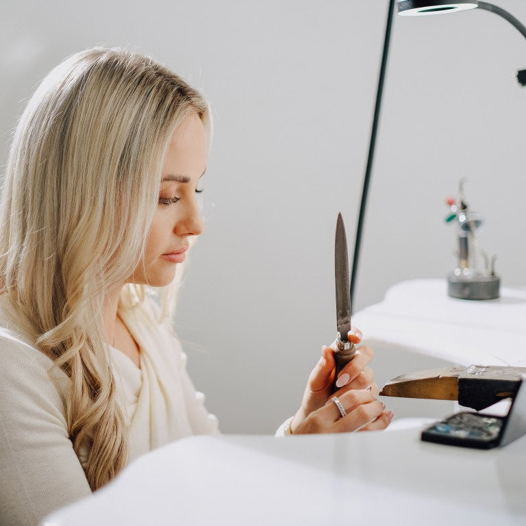 filing and polishing custom engagement ring