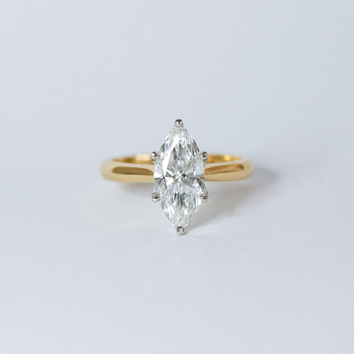 Marquise Fleur solitaire engagement ring