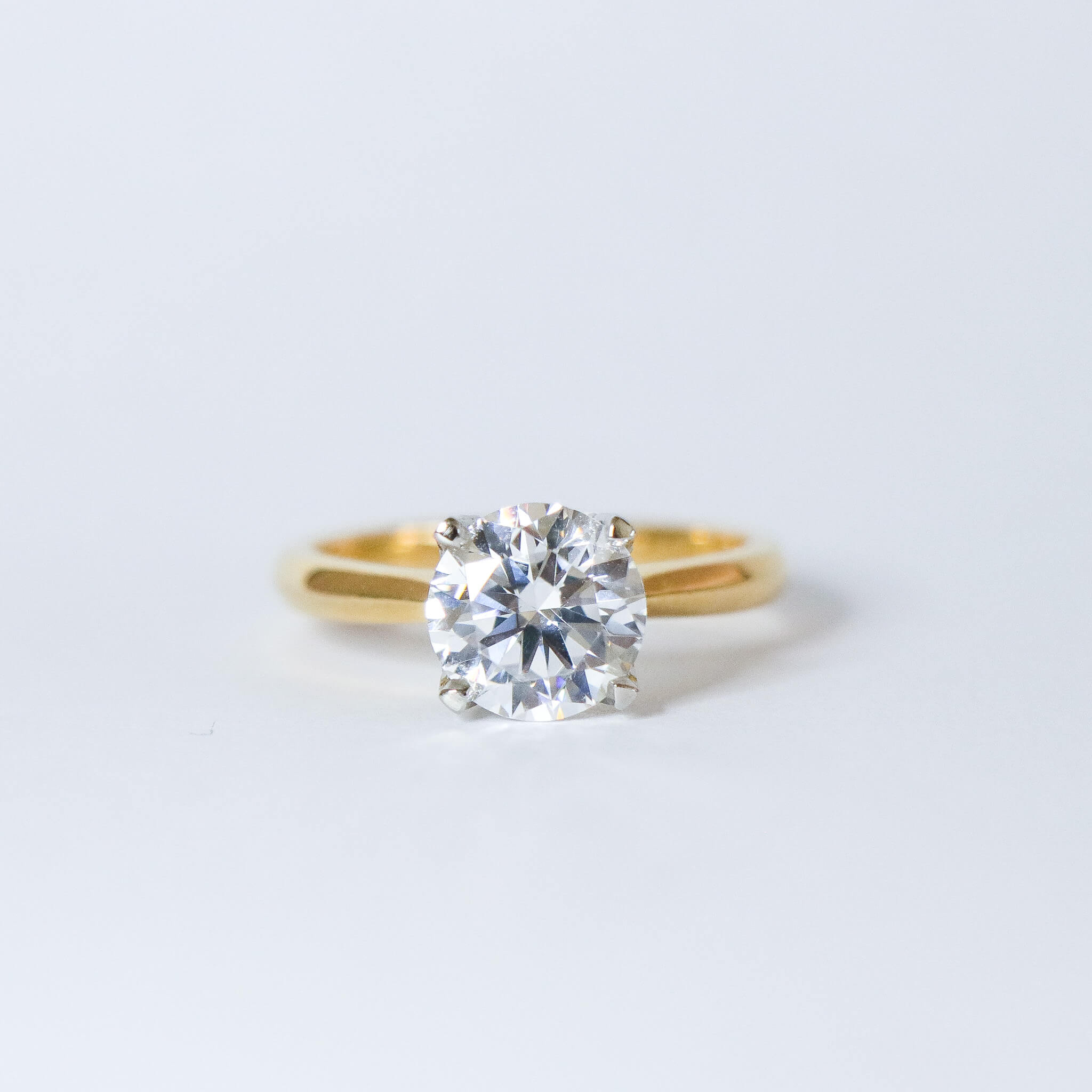 2 carat round brilliant diamond Fleur solitaire engagement ring