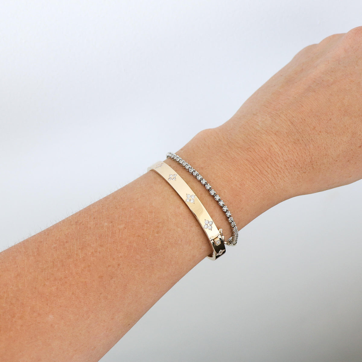 Clover bracelet on wrist